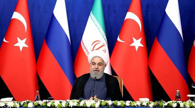 Iran's President Hassan Rouhani at a joint press conference with Russia's President Vladimir Putin and Turkey's President Recep Tayyip Erdogan in Tehran. (AP)