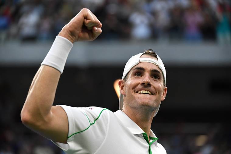 John Isner of the United States celebrates after defeating Milos Raonic of Canada (not pictured) in a fourth round match on day seven of the 2018 U.S. Open tennis tournament at USTA Billie Jean King National Tennis Center.
