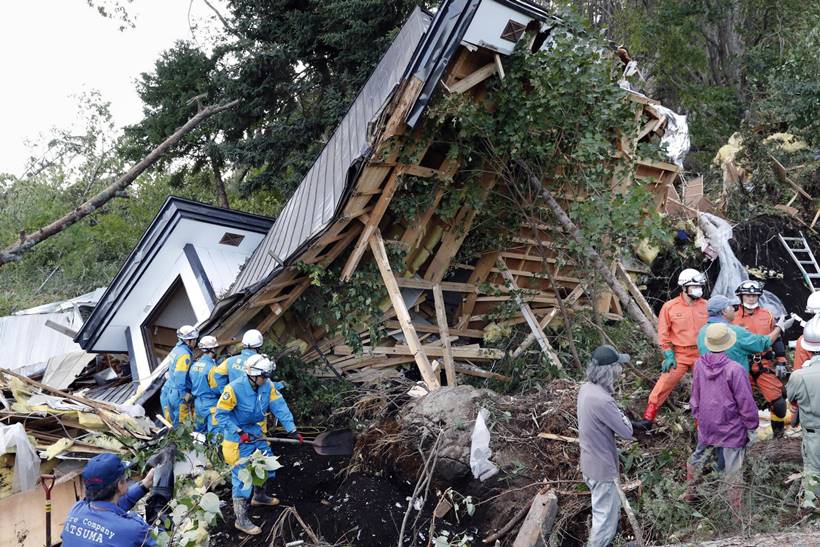 Japan earthquake toll rises as rescuers dig through landslides
