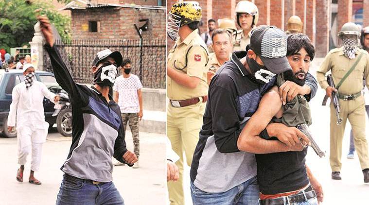 The masked man hurling stones during protest. (PTI)