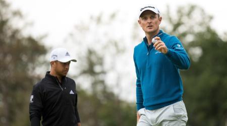 Sep 8, 2018; Newtown Square, PA, USA; Justin Rose reacts in front of Xander Schauffele after making par on the 14th hole during the third round of the BMW Championship golf tournament at Aronimink GC. Mandatory Credit: Bill Streicher-USA TODAY Sports
