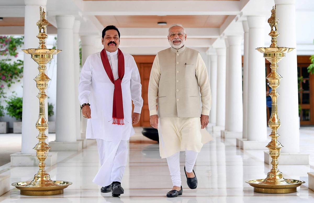 Prime Minister Narendra Modi with former Sri Lankan president Mahinda Rajapaksa in New Delhi on Wednesday. (PTI photo)