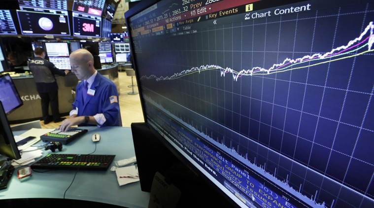 A screen showing a chart at a stock market