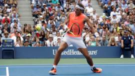Rafael Nadal, of Spain, reacts after defeating Nikoloz Basilashvili, of Georgia, during the fourth round of the U.S. Open tennis tournament