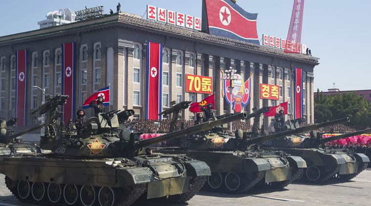 N. Korea stages military parade, holds back on advanced missiles