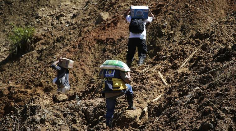 typhoon Mangkhut, Philippines, Philippines landslide, Philippines rescue operations, landslide death toll, Philippines weather, Philippines rain, Philippines storm, World News, Indian Express