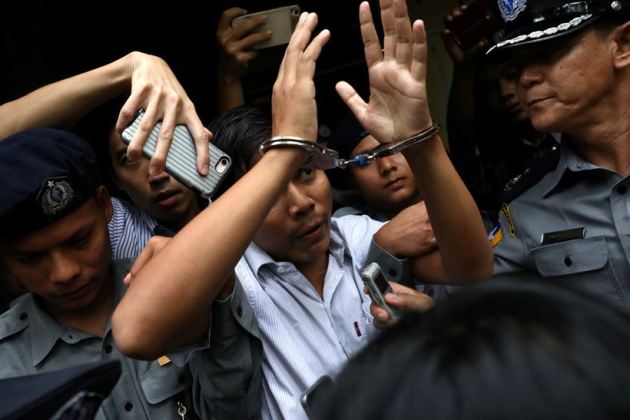 Myanmar court jails Reuters reporters for 7 years in landmark secrets case