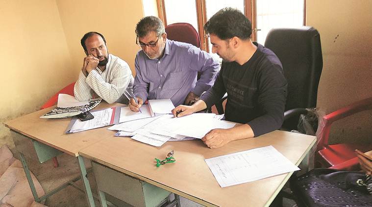 Block Development Officials at a special camp in Ringi village. (Express photo/Bashaarat Masood)
