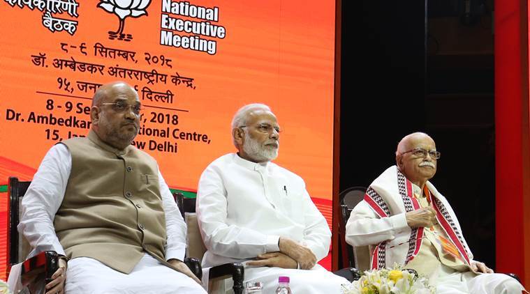 Prime Minister Narendra Modi with BJP leaders Amit Shah and LK Advani at the event in the national capital on Thursday.