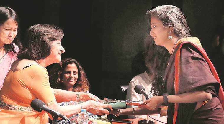 Smita Nair receives the Cushrow Irani prize for Environmental Reporting from Threety Irani, in Kolkata. (Express photo/Partha Paul)