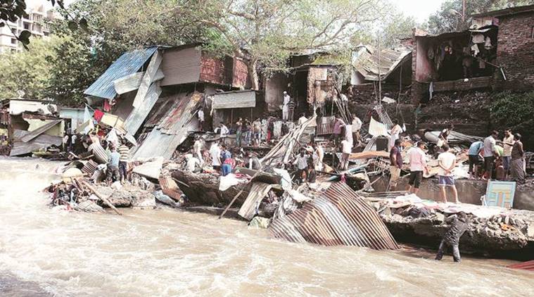 Marooned In Pune Water Gushes Through Damaged Canal Wall Destroys 