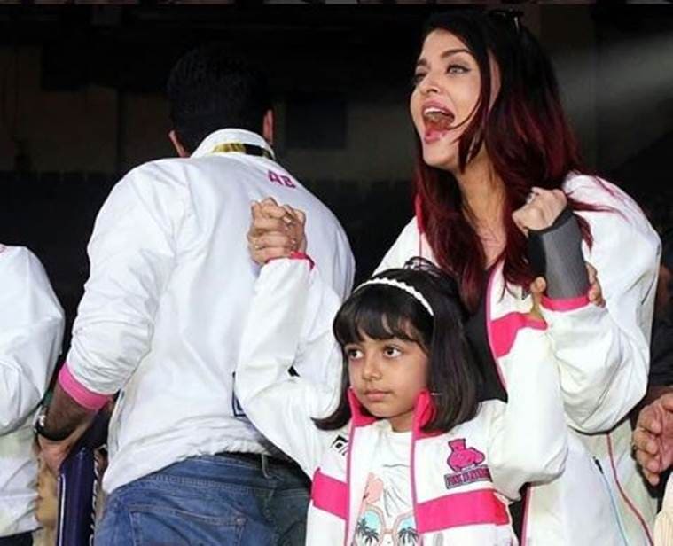 Abhishek Bachchan Aishwarya Rai Aaradhya cheer Pro Kabaddi League Pink Panthers photos