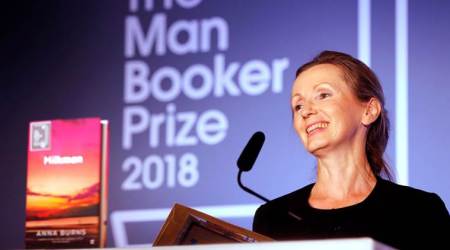 Writer Anna Burns smiles after she was presented with the Man Booker Prize for Fiction 2018 by Britain's Camilla, the Duchess of Cornwall during the prize's 50th year at the Guildhall in London, Britain, October 16, 2018. Frank Augstein/Pool via REUTERS