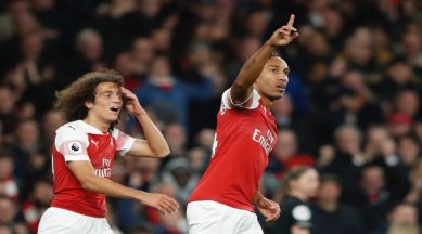 Arsenal's Pierre-Emerick Aubameyang, right, celebrates after scoring his side's third goal of the game during the English Premier League soccer match between Arsenal and Leicester City at the Emirates stadium in London