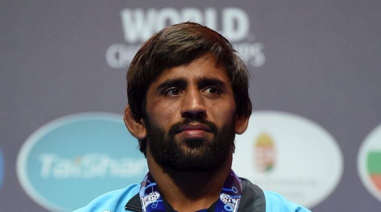 Silver medal winning Bajrang Bajrang of India stands on the podium during the medal ceremony of men's freestyle 65kg category of the Wrestling World Championships in Budapest, Hungary,