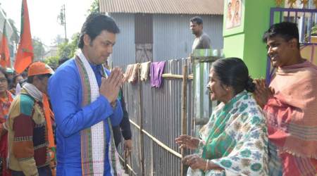 Political leader Biplab Deb during a door to door campaigning. Express photo by Abhishek Saha