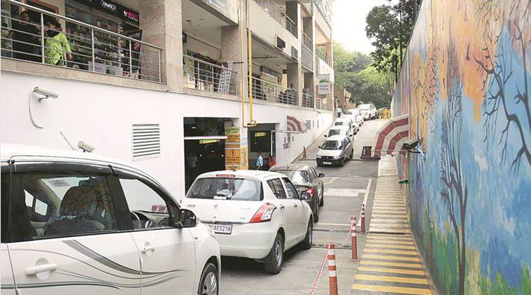 Multi-level parking lot at Sarojini Nagar.