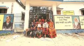 The mothers of the two murdered college students sit with other women in front of Daribhit High School. (Express photo/Subham Dutta)