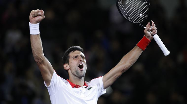 Novak Djokovic of Serbia celebrates after defeating Borna Coric of Croatia in their men's singles final match in the Shanghai Masters tennis tournament