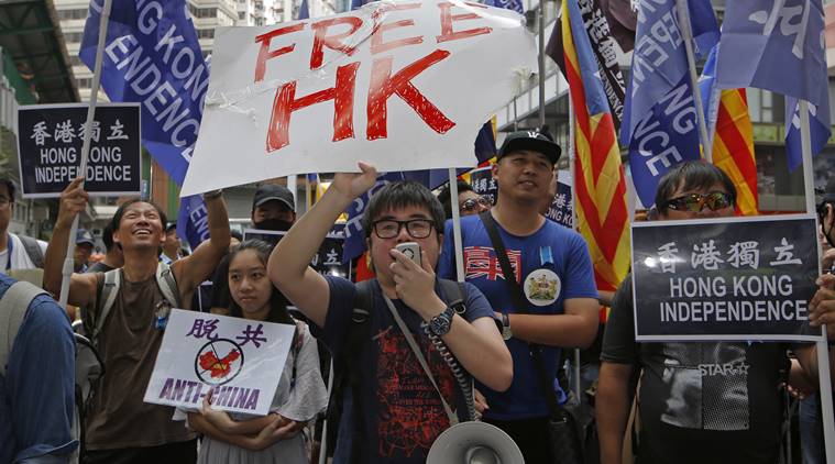 Heeding China's call, Hong Kong tightens grip on dissent