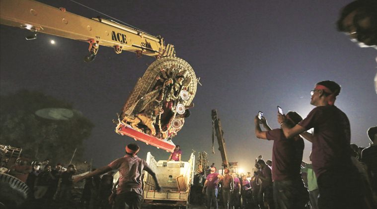 delhi dcp, yamuna ghat police attacked, dcp attacked, delhi police idol, delhi police durga idol, dcp yamuna, indian express