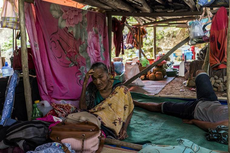 A woman at a makeshift camp after being displaced by the tsunami