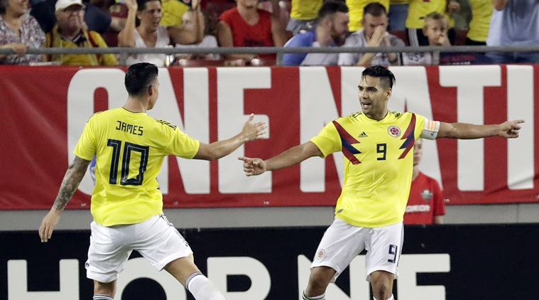 Colombia's Radamel Falcao (9) celebrates his goal against the United States with teammate James Rodriguez (10) during the second half of an international friendly soccer match