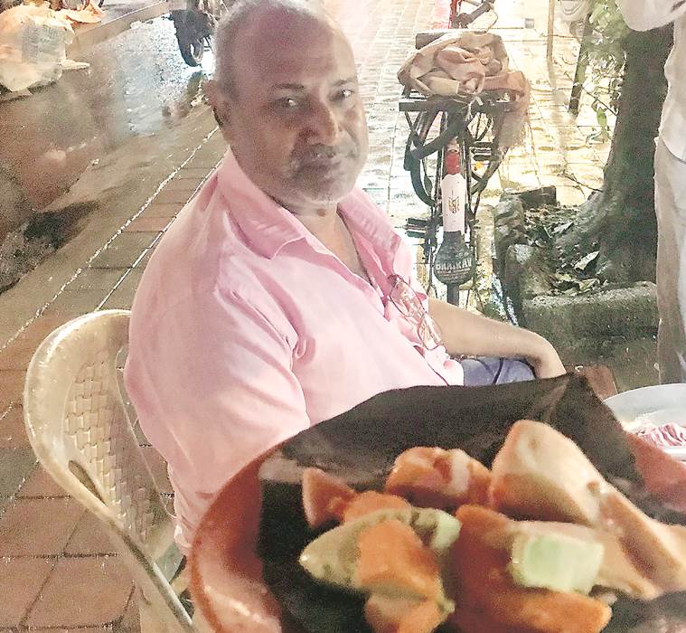 mumbai by night, mumbai man serving kulfi, narendra singh, annie besant road, indian express, century bazaar