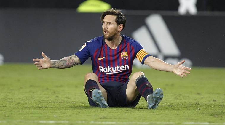 Barcelona forward Lionel Messi reacts after failing to score against Valencia during the Spanish La Liga soccer match between Valencia and Barcelona, at the Mestalla stadium