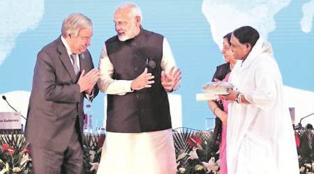 Prime Minister Narendra Modi introduces spiritual leader Mata Amritanandamayi to UN Secretary General Antonio Guterres at an event Tuesday. (Photo: Reuters)