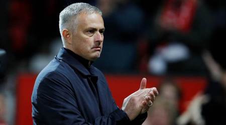 Manchester United manager Jose Mourinho applauds the fans at the end of the match. (REUTERS)
