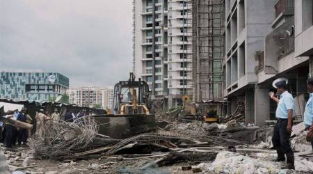 Pune: Debris of under-construction building that collapsed being cleared, in Balewadi area in Pune on Friday. PTI  Photo (PTI7_29_2016_000172B)