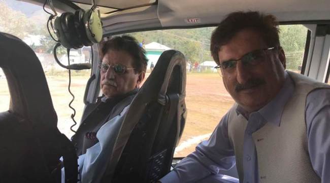 PoK PM Raja Farooq (left) with Minhas in the chopper. (Courtesy: Mushtaq Minhas)