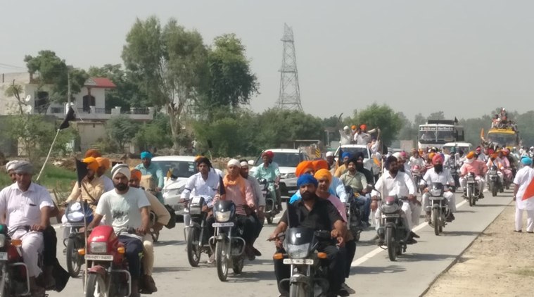 Party supporters throng the streets of Punjab on Sunday. (Express photo)