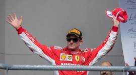 Ferrari driver Kimi Raikkonen (7) of Finland celebrates winning the United States Grand Prix at Circuit of the Americas.