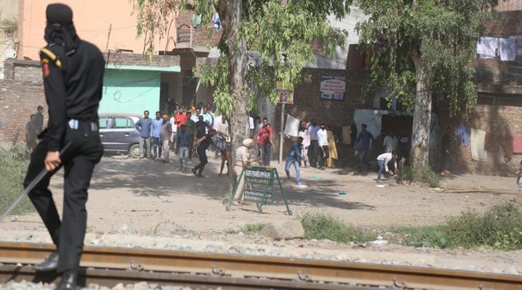 Amritsar train tragedy: Angry protestors clamber for stones while police try to get them off track