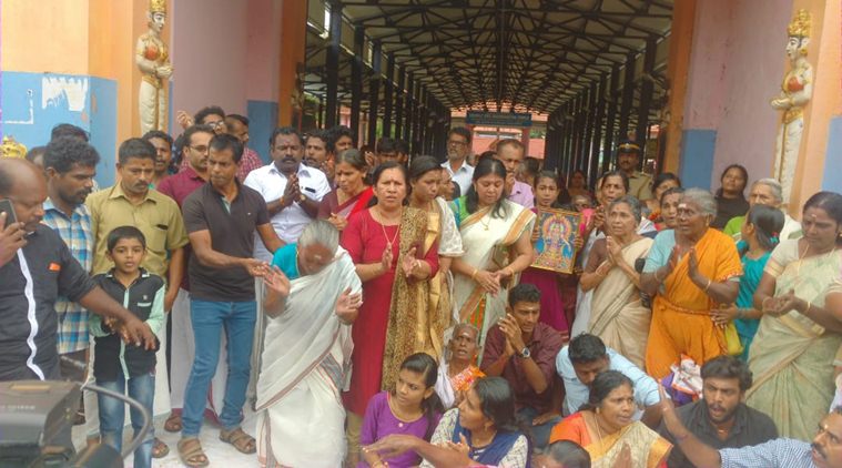 Women devotees protest against the SC verdict outside Erumeli Dharma Shastha Temple in Kerala on Friday. (Express photo)