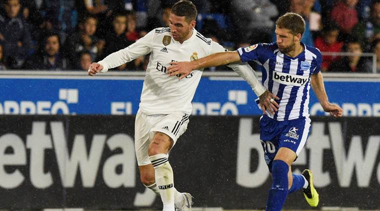 Real Madrid's Sergio Ramos in action with Alaves' Darko Brasanac REUTERS