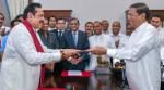 Sri Lanka's ex-president Mahinda Rajapaksa sworn in as prime minister amid political drama