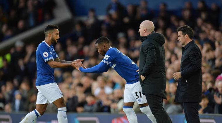 Everton's Ademola Lookman comes on as a substitute to replace Theo Walcott as manager Marco Silva looks on