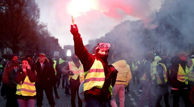 France: Protests over rising fuel prices intensify, police use water ...