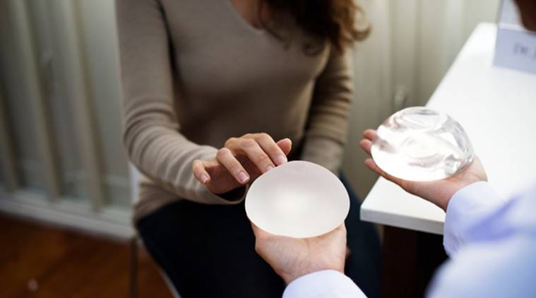 Complaints over side-effects of breast implants have DOUBLED in a