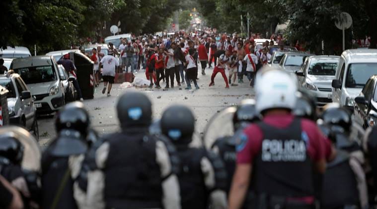 River Plate's fans clash with riot police after the Copa Libertadores Final, Second leg v Boca Juniors match was postponed.