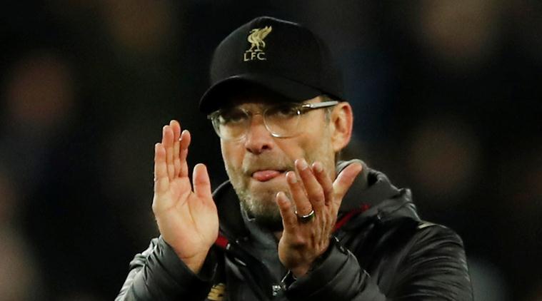 Liverpool manager Juergen Klopp applauds the fans at the end of the match