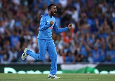 India's Krunal Pandya celebrates after taking the wicket of Australia's Ben McDermott during their Twenty20 cricket match in Sydney