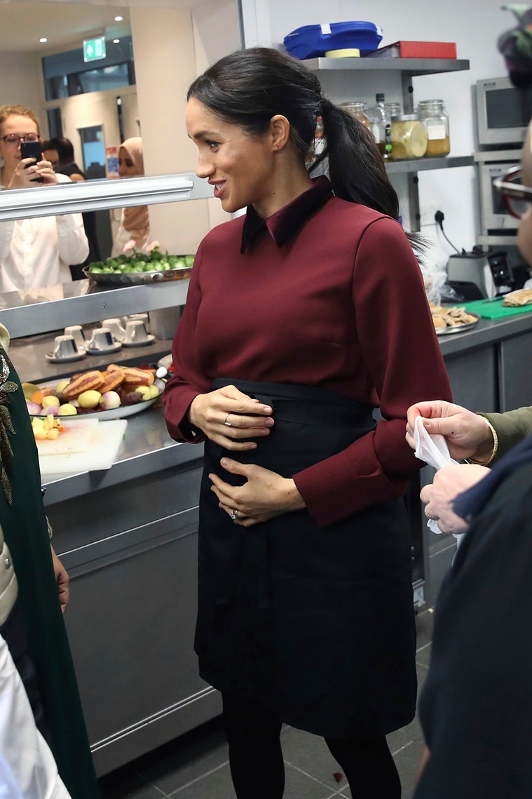 meghan markle, prince harry, meghan markle recent photos, meghan markle prince harry latest photos, meghan markle pregnancy, hubb community kitchen, meghan markle hubb community kitchen, celeb fashion, the royals, the royals fashion, meghan markle fashion, indian express, indian express news