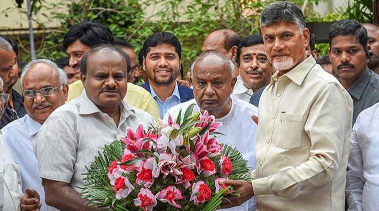 Andhra Pradesh Chief Minister N Chandrababu Naidu (R) greets Karnataka Chief Minister HD Kumaraswamy (L) and former prime minister HD Devegowda (C) before a meeting in Bengaluru on Thursday. (PTI)