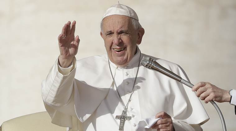 Pope Francis says world mustn't turn a blind eye to migrants, the poor
