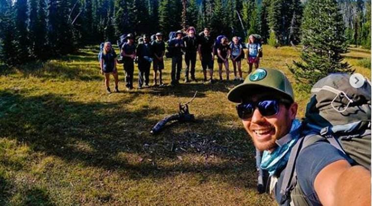 Chau with a group of students around Mount Adams. (Instagram/johnachau)