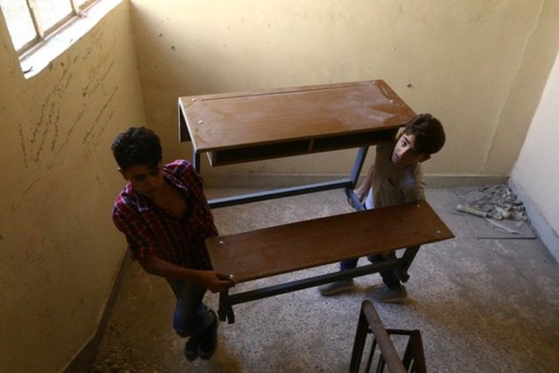With little aid, Syria's Raqqa struggles to revive schools